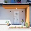Porte d'entrée Passage modèle Adonite - Mise en situation sur une maison